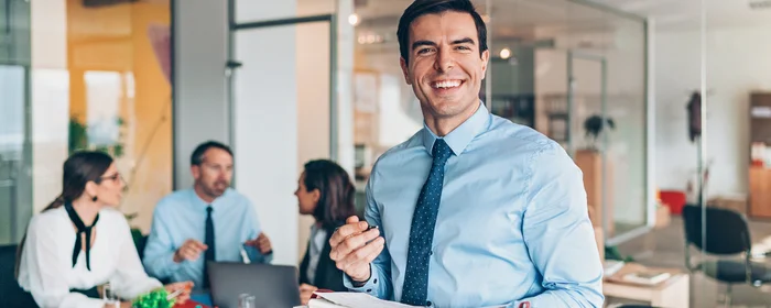 a school team including principal and other staff viewing annual revenue report with using zaarvis school erp 